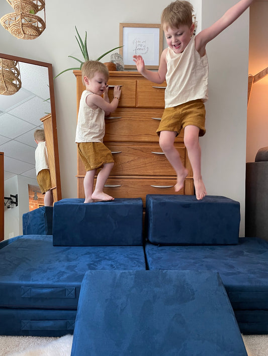 Kids jumping on Figgy play couch