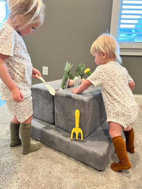 You’ve heard of the Montessori Method, here’s how the Figgy Play Couch helps bring it home!
