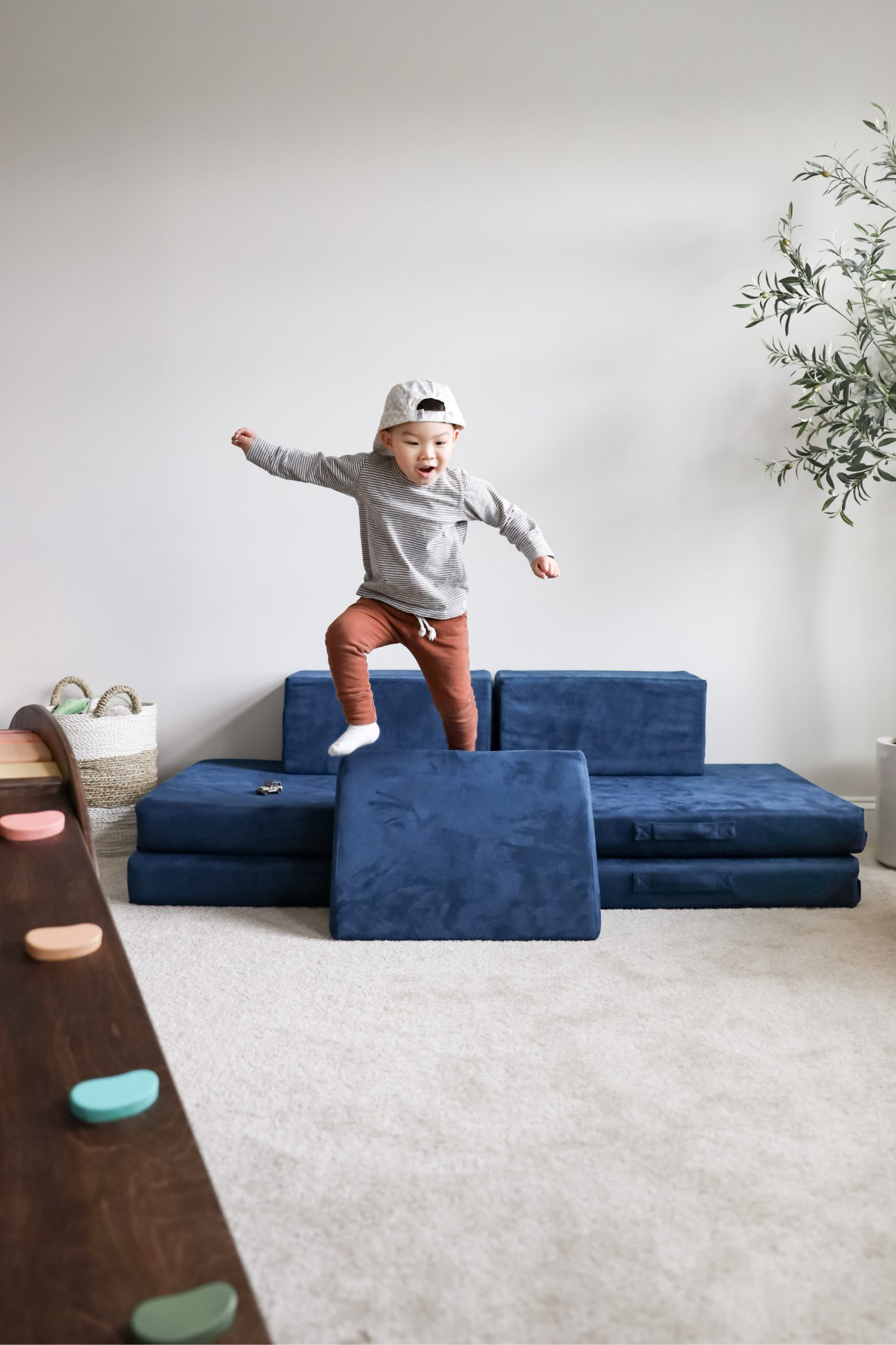 Child jumping on Play couch