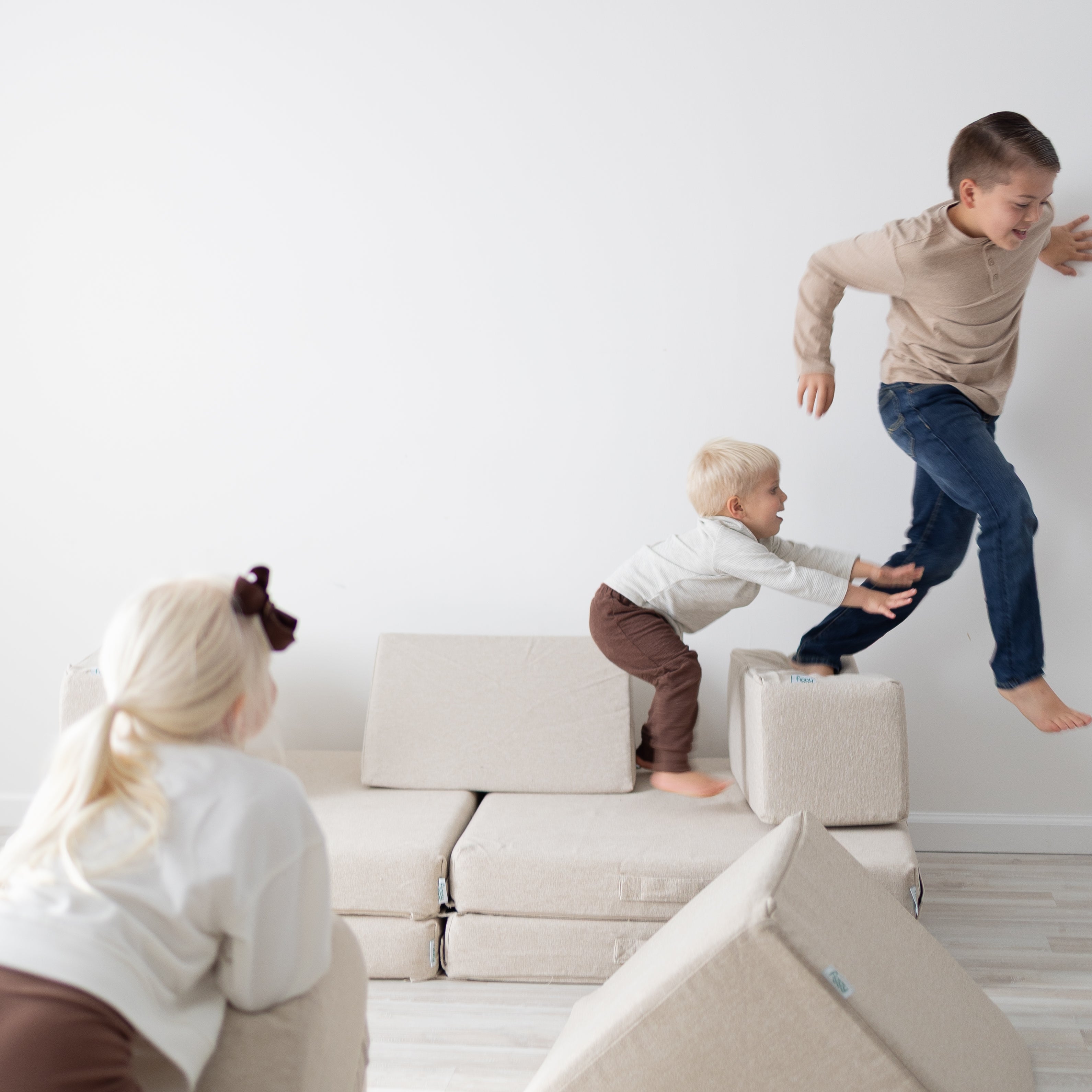 Three kids playing together on Figgy