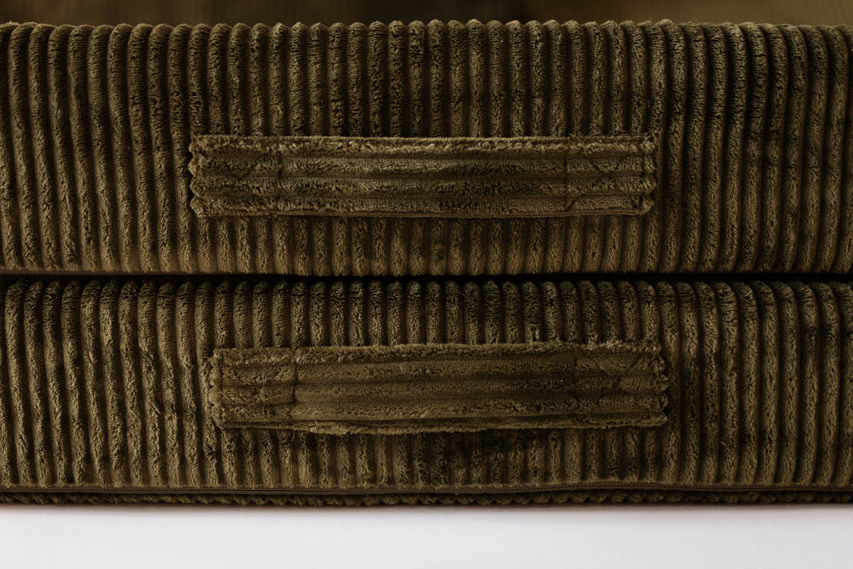 Close up of Moss corded plush Adventure Mat carry handles