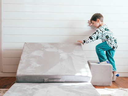 Photo of child on Mini Figgy Play Couch